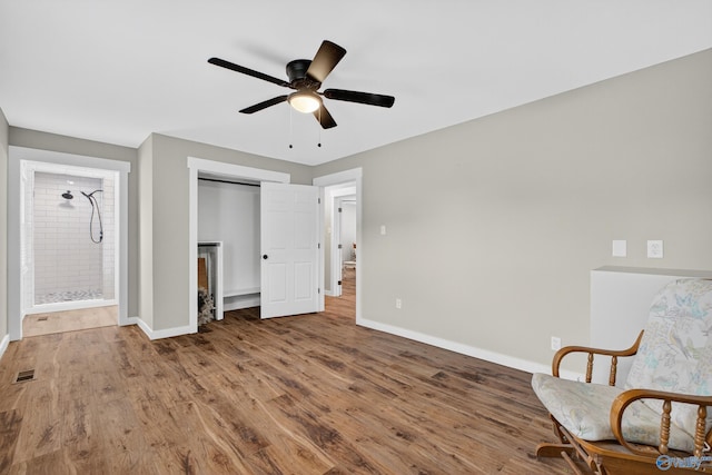 2605 Ready Section Rd, Toney, AL 35773 - living area with ceiling fan and wood finished floors