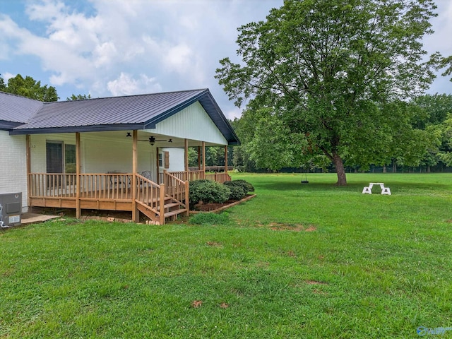 2605 Ready Section Rd, Toney, AL 35773 - view of side of property featuring a metal roof and a lawn