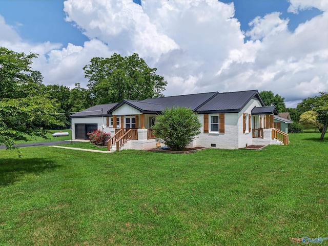 2605 Ready Section Rd, Toney, AL 35773 - view of front facade with an attached garage, a front lawn, a metal roof, and crawl space
