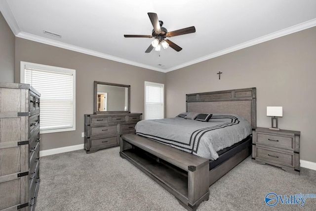 bedroom with crown molding, visible vents, a ceiling fan, light carpet, and baseboards