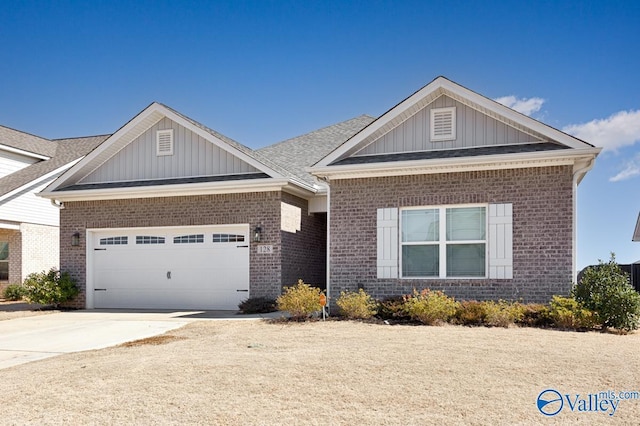 view of front of house featuring a garage, concrete driveway, brick siding, and a shingled roof