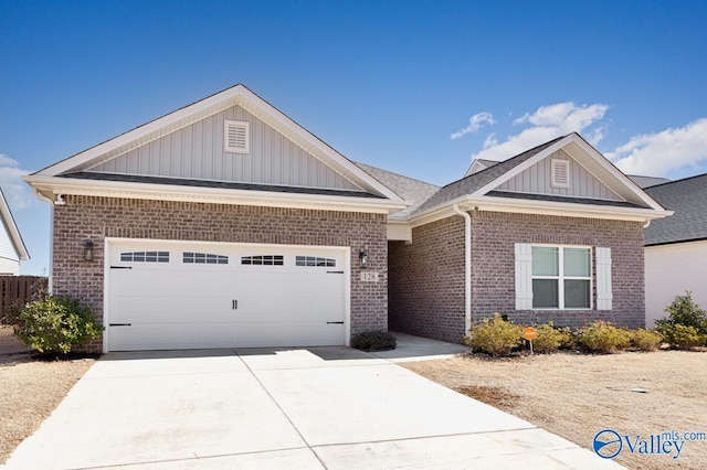 view of front of property featuring driveway, brick siding, board and batten siding, and an attached garage