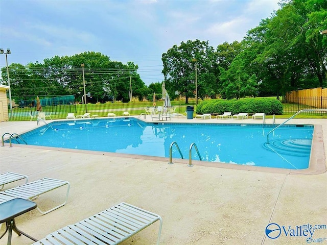 view of pool with a patio area