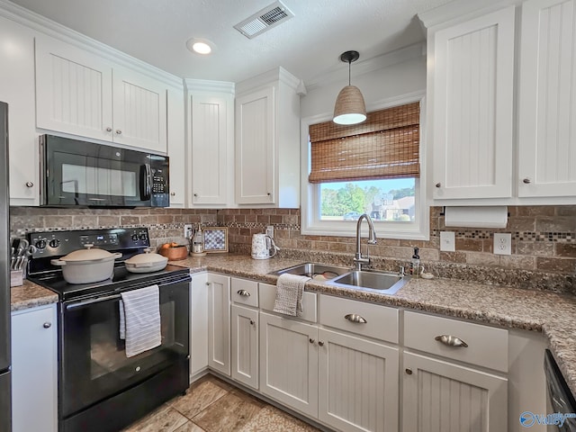 kitchen featuring hanging light fixtures, backsplash, sink, black appliances, and white cabinets