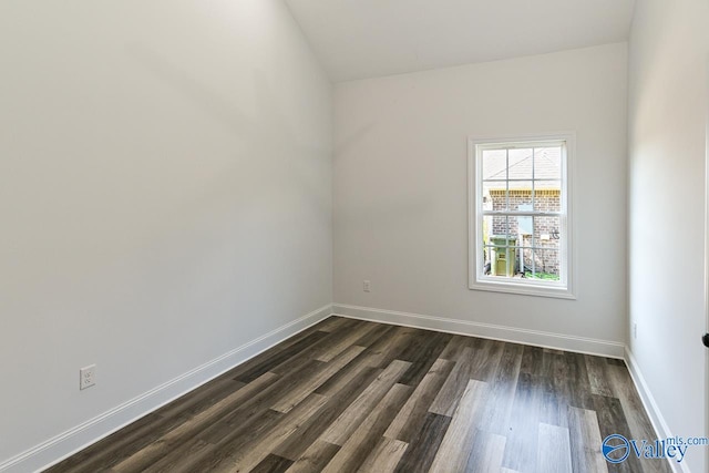 empty room featuring dark hardwood / wood-style floors