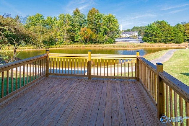 wooden deck featuring a water view