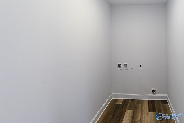 clothes washing area with electric dryer hookup, hookup for a washing machine, and dark hardwood / wood-style floors