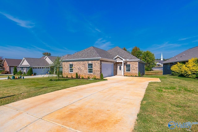 view of front of property with a front lawn and a garage