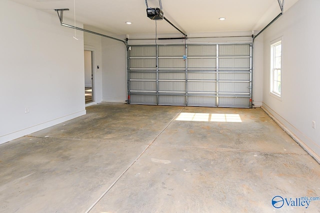 garage featuring a garage door opener