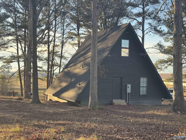 view of property exterior at dusk