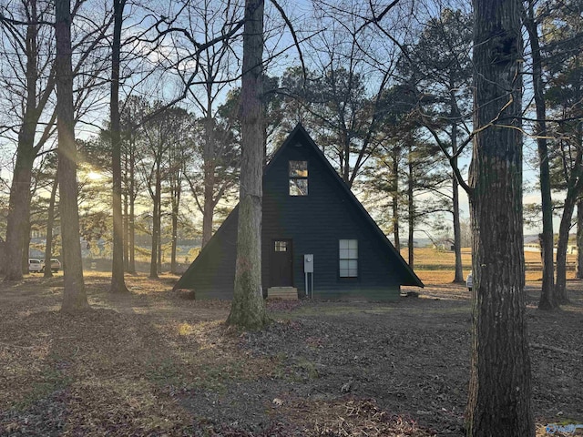 view of property exterior at dusk