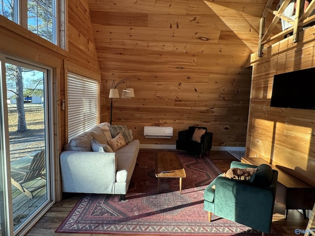 living room featuring vaulted ceiling and wooden walls