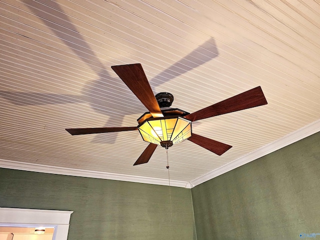 room details with ceiling fan and crown molding