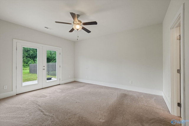 700 Magnolia Place Ln SW, Hartselle, AL 35640 - unfurnished room with carpet, ceiling fan, baseboards, and french doors