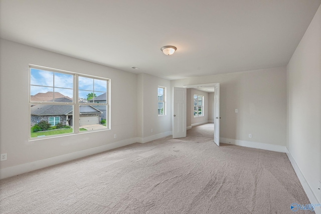 700 Magnolia Place Ln SW, Hartselle, AL 35640 - unfurnished room featuring light carpet and baseboards