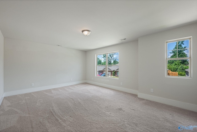 700 Magnolia Place Ln SW, Hartselle, AL 35640 - carpeted spare room with baseboards