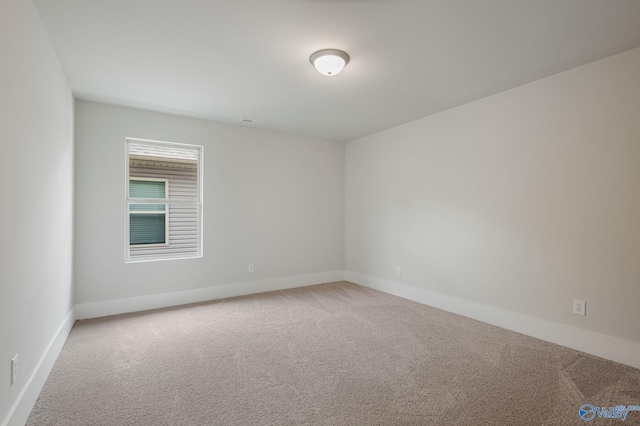 700 Magnolia Place Ln SW, Hartselle, AL 35640 - carpeted spare room with baseboards
