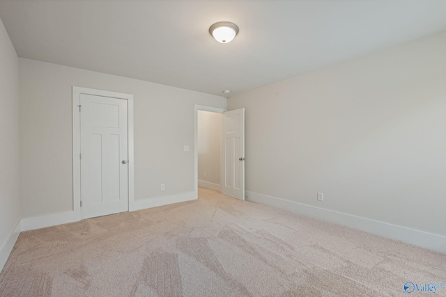 700 Magnolia Place Ln SW, Hartselle, AL 35640 - unfurnished bedroom with light carpet and baseboards