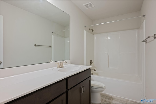 700 Magnolia Place Ln SW, Hartselle, AL 35640 - bathroom featuring vanity, toilet, and shower / bathtub combination