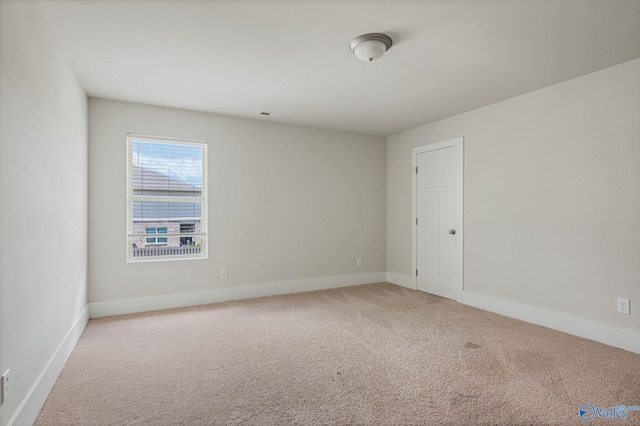 700 Magnolia Place Ln SW, Hartselle, AL 35640 - empty room with carpet flooring and baseboards