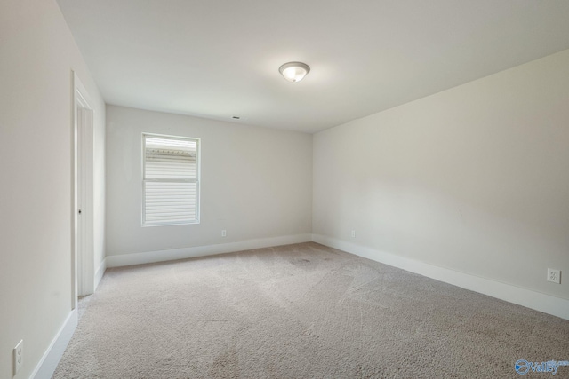 700 Magnolia Place Ln SW, Hartselle, AL 35640 - carpeted spare room with baseboards