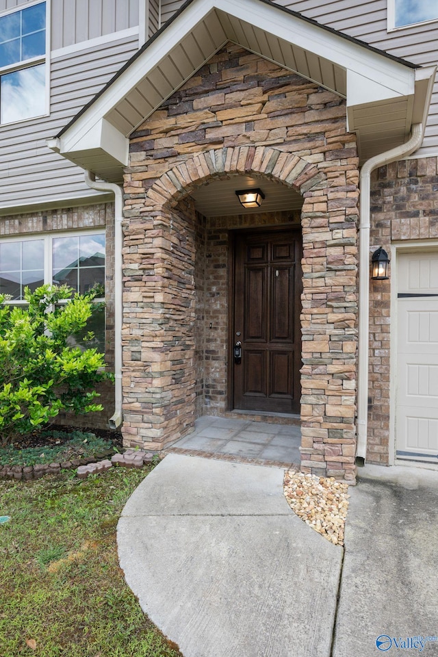 700 Magnolia Place Ln SW, Hartselle, AL 35640 - doorway to property featuring stone siding