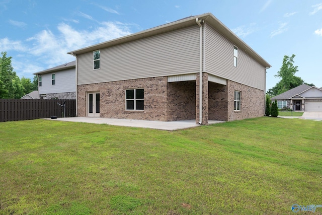 700 Magnolia Place Ln SW, Hartselle, AL 35640 - back of house featuring a patio area and brick siding