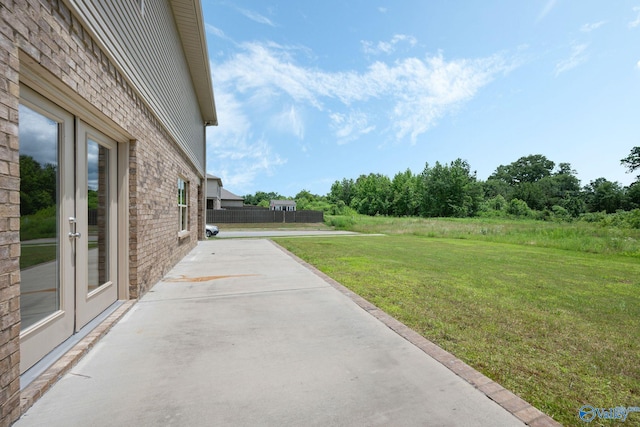 700 Magnolia Place Ln SW, Hartselle, AL 35640 - view of grassy yard with a patio