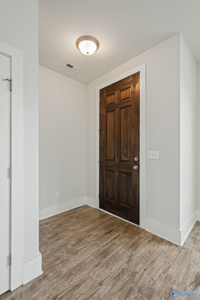 700 Magnolia Place Ln SW, Hartselle, AL 35640 - foyer entrance featuring wood finished floors and baseboards