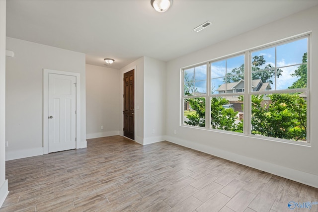700 Magnolia Place Ln SW, Hartselle, AL 35640 - empty room featuring light wood-style flooring and baseboards