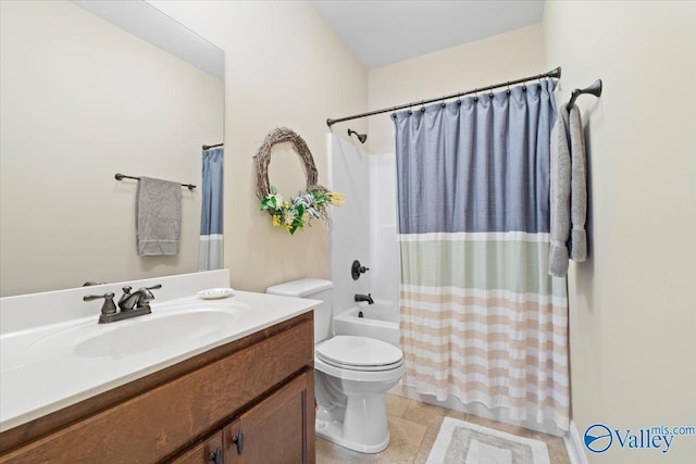 full bathroom with toilet, shower / bath combo with shower curtain, and vanity