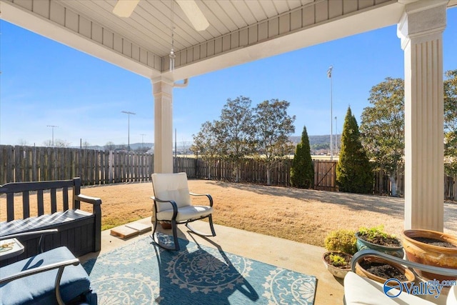 view of patio featuring ceiling fan