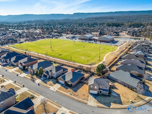 drone / aerial view featuring a mountain view