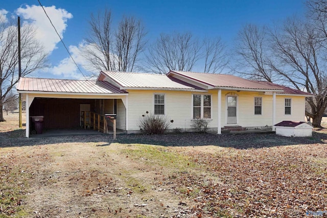 single story home with a carport