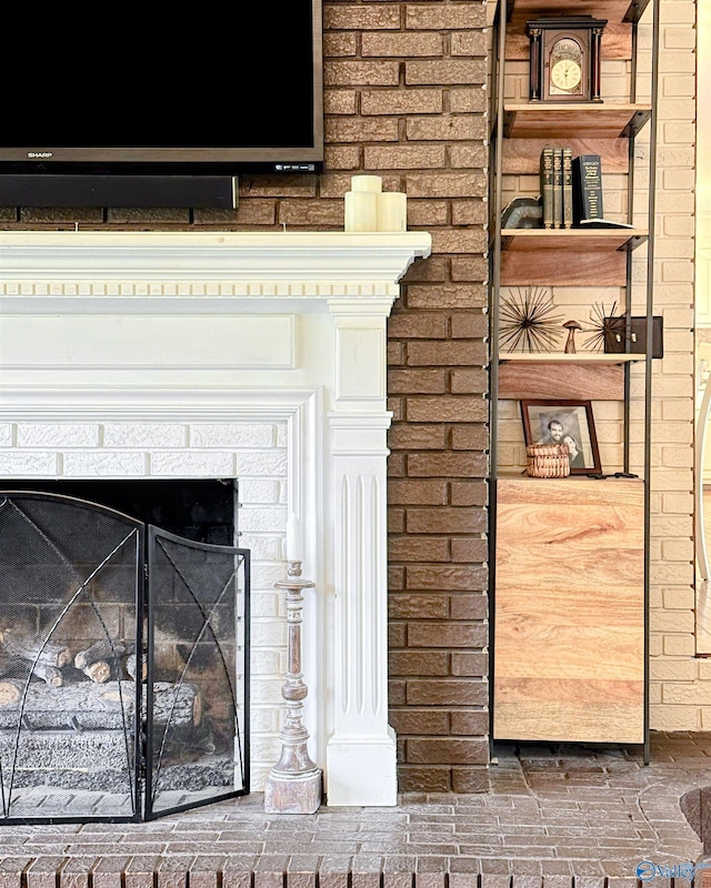 details with a brick fireplace