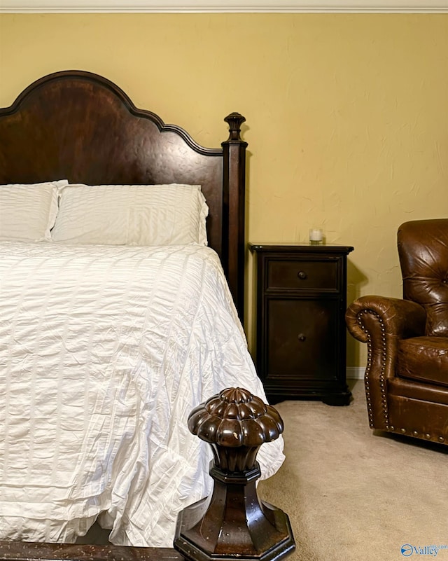 bedroom featuring light carpet