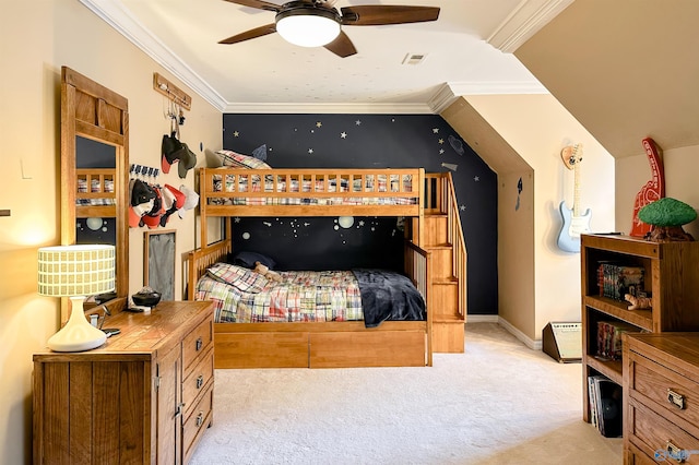 bedroom featuring visible vents, baseboards, ornamental molding, and carpet floors