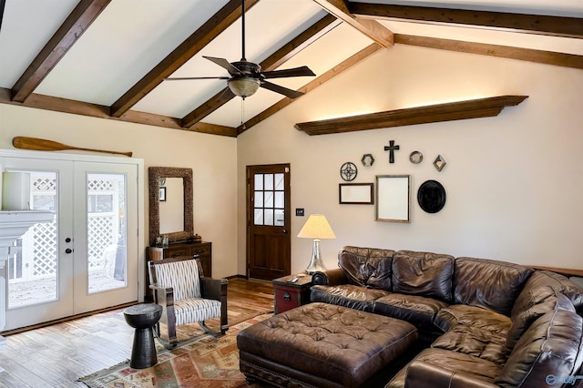living room featuring french doors, a ceiling fan, beam ceiling, high vaulted ceiling, and wood finished floors