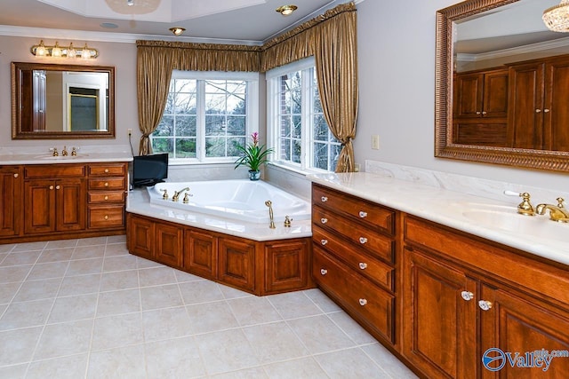 full bathroom with crown molding, a sink, a garden tub, two vanities, and tile patterned flooring