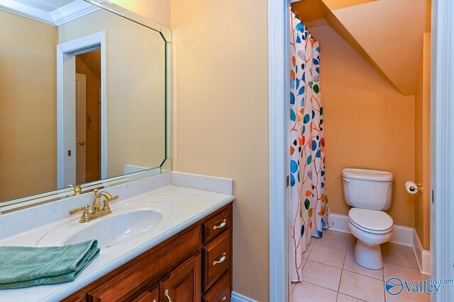 bathroom with a shower with curtain, tile patterned flooring, vanity, toilet, and baseboards