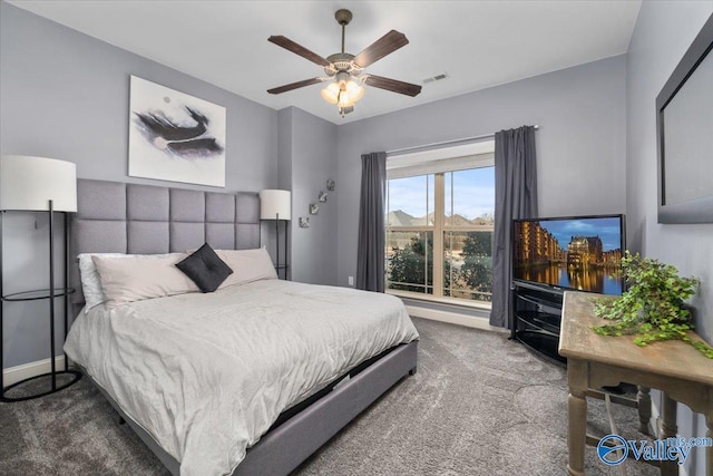 carpeted bedroom with ceiling fan