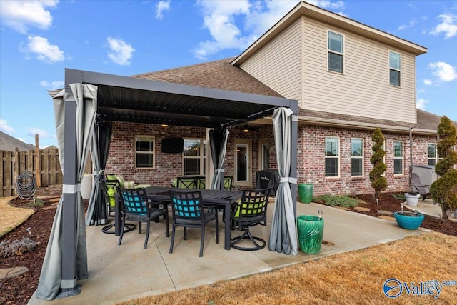 rear view of house featuring a patio