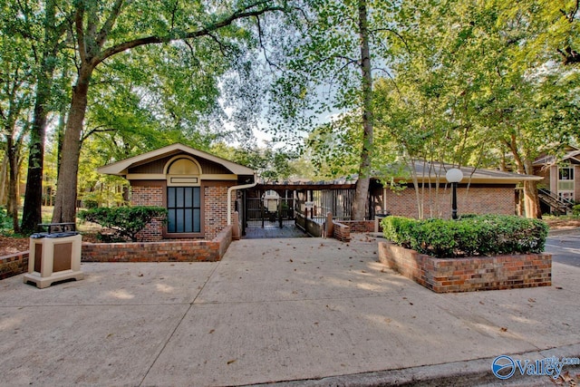 view of front of house with a patio area