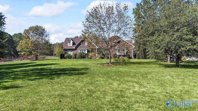 view of front of home featuring a front lawn