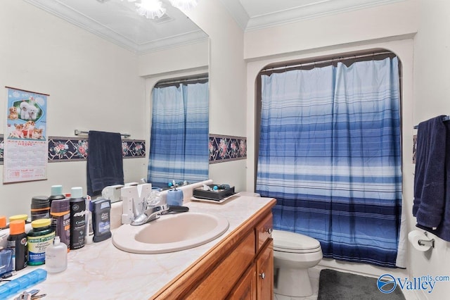 bathroom with vanity, toilet, crown molding, and walk in shower