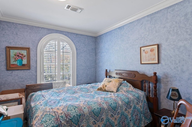 bedroom with visible vents, crown molding, and wallpapered walls