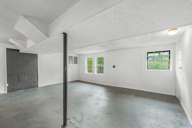 basement featuring plenty of natural light