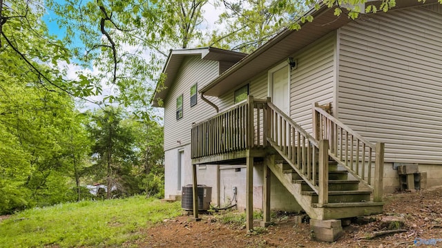 view of property exterior featuring central AC