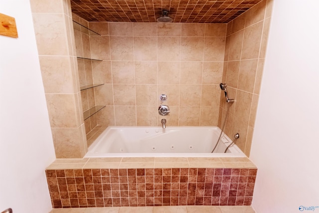 bathroom with a combined bath / shower with rainfall shower