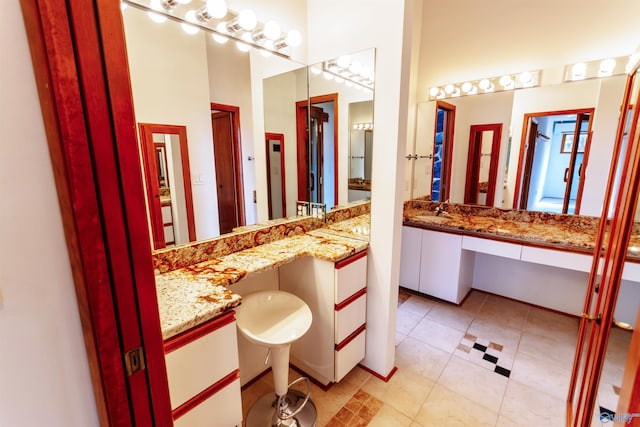 bathroom featuring a sink and tile patterned floors